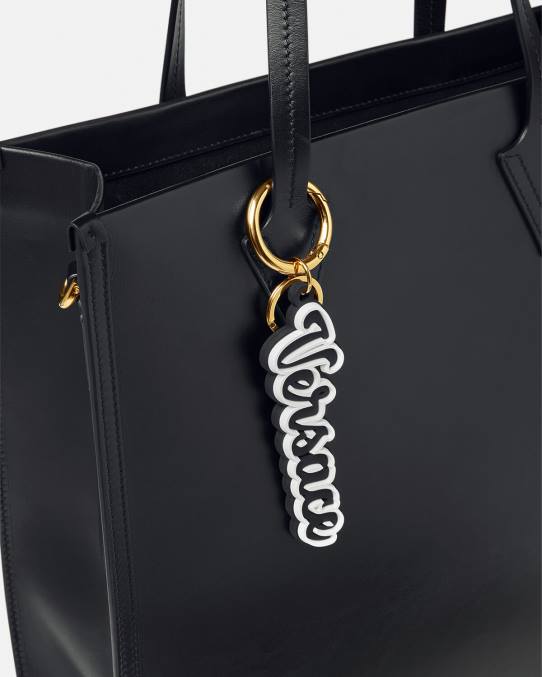 Versace accesorios hombres llavero de silicona con logo universitario 6BPV1665 negro