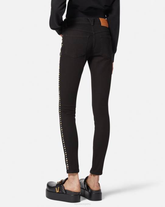 Versace ropa mujer jeans ajustados con tachuelas de Medusa 6BPV214 negro